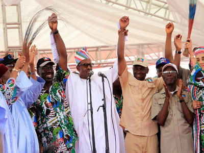 PIC.21. PRESIDENT MUHAMMAD BUHARI (M) PRESENTING THE EDO APC GOVERNORSHIP CANDIDATE, MR GODWIN OBASEKI (L) AND DEPUTY GOVERNORSHIP CANDIDATE, MR PHILIP SHAIBU (R) DURING THE APC MEGA RALLY FOR THE 2016 GOVERNORSHIP ELECTION AT THE SAMUEL OGBEMUDIA STADIUM IN BENIN ON TUESDAY (6/9/16). WITH THEM ARE FORMER GOVERNOR OF YOBE, SEN. ABBA IBRAHIM (L); GOV. ADAMS OSHIOMHOLE AND HIS WIFE LARA (R). 6804//6/9/2016/ESI/BJO/NAN